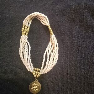 Rustic Cuff Ivory and Gold Multi-Strand Beaded Bracelet with Medallion